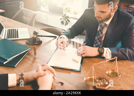 Agreement with attorney in office. Law and justice concept Stock Photo
