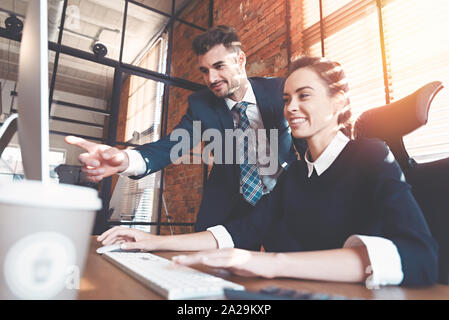 Team business couple working in office. Cooperation and co-working concept Stock Photo