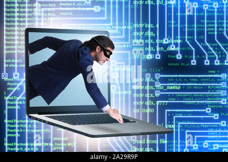 The hacker man trying to steal personal data Stock Photo