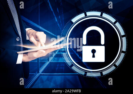 business man using  tablet computer and cyber security concept Stock Photo