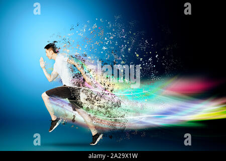 Young man running forward with speed concepts Stock Photo