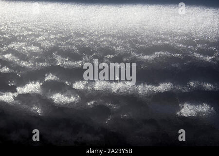 Snow texture with a hard light Stock Photo