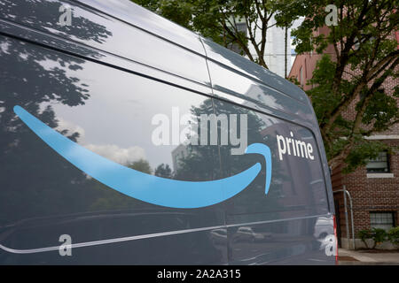 Portland, Oregon, USA - Sep 13, 2019: Closeup of the logo on an Amazon Prime branded van parked on the roadside in downtown Portland. Stock Photo