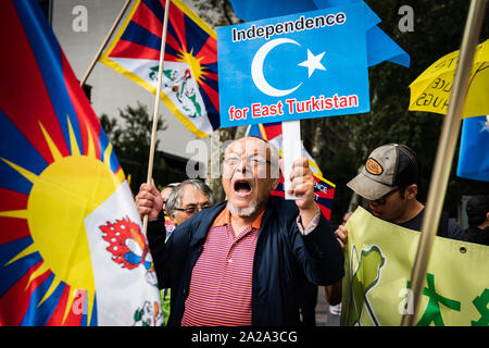 New York, United States. 01st Oct, 2019. Protestors from East Turkistan, Tibet, Taiwan, Hong Kong, South Mongolia, and Manchuria rally against the Chinese oppression of their home countries on the 70th anniversary of the People's Republic of China in Dag Hammarskjöld Plaza across from the United Nations in New York City on October 1, 2019. (Photo by Gabriele Holtermann-Gorden/Pacific Press) Credit: Pacific Press Agency/Alamy Live News Stock Photo