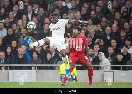 London, UK. 01st Oct, 2019. Soccer: Champions League, Tottenham Hotspur - FC Bayern Munich, Group stage, Group B, 2nd matchday at Tottenham Hotspur Stadium. Serge Aurier from Tottenham (l) and David Alaba from FC Bayern Munich in the duel for the ball. Credit: Matthias Balk/dpa/Alamy Live News Stock Photo
