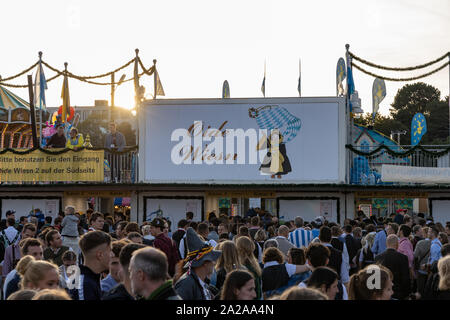 Munich, Germany, 2019 September 19: Aerial view of tourist and locals in front of the entrance of the Oide Wiesn. The Oide Wiesn is a port of the Stock Photo