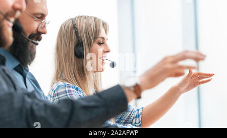close up. the business team work on their computers together. Stock Photo