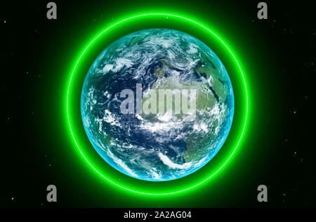 Saving the planet concept with a bright green barrier around the earth Stock Photo