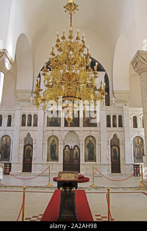 Golden chandelier and Saint icons in the interior of The Alexander Nevski Serbian Orthodox Church, Belgrade, Serbia. Stock Photo