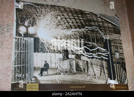 Black and white photograph of Nikola Tesla operating a Tesla coil at Colorado springs in 1899, Nikola Tesla Museum, Belgrade, Serbia. Stock Photo