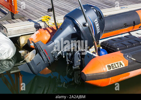 18 September 2019 A powerful outboard engine on a rib moored in the marina at Port Solent in Hampshire on the South Coast of England Stock Photo