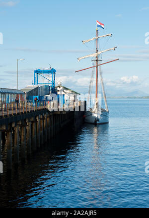 Tall ship moored along side Oban Ferry Terminal. Oban, Scotland Stock Photo