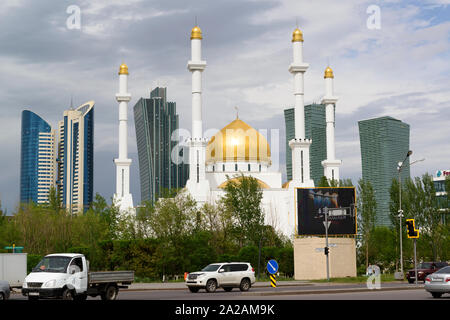 Mosque and modern skyscrapers in Nur-Sultan, Kazakhstan. Stock Photo