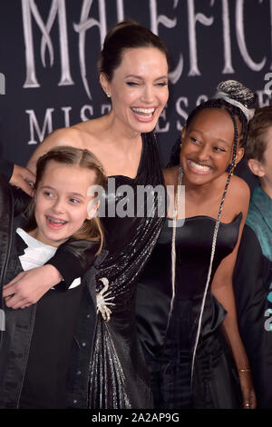 Vivienne Marcheline Jolie-Pitt, Angelina Jolie and Zahara Marley Jolie-Pitt at the world premiere of the movie 'Maleficent: Make the Dark / Maleficent: Mistress of Evil' at the El Capitan Theater. Los Angeles, 30.09.2019 | usage worldwide Stock Photo