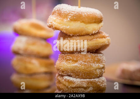 Pile of sugared donuts, typical Italian fried donuts Stock Photo