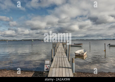 Small Jetty pier near Egernsund at Gendarmstien, Denmark Stock Photo