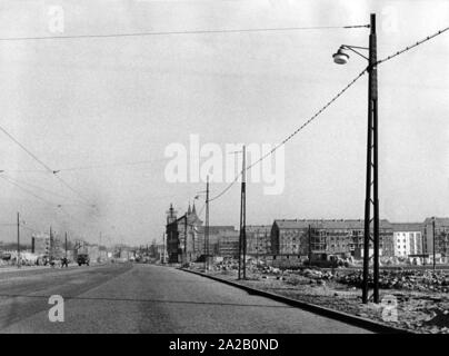 View of a broad street in Frankfurt / Oder, in the background are large residential blocks that are just emerging. Stock Photo