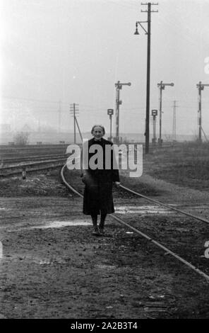 Anna Stadler from Gundelfingen was the first German woman to be awarded the Order of the French Legion of Honor in 1959. During the Second World War, she looked after French prisoners of war in secret and helped some of them to flee shortly before the end of the war. The picture shows her at the railway embankment, where, during the war, she had hidden food for the prisoners under the thresholds. Stock Photo