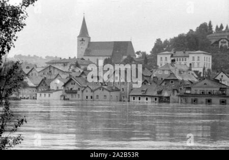 The flood in Passau and other parts of Lower Bavaria (July, 1954) were also referred to as the flood of the century. The Danube, the Inn and the Ilz had overflowed their banks, and flooded towns and villages.  Here, view of the flooded city of Passau. Stock Photo