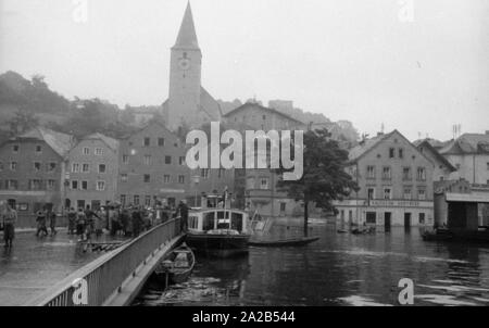 The flood in Passau and other parts of Lower Bavaria (July, 1954) were also referred to as the flood of the century. The Danube, the Inn and the Ilz had overflowed their banks, and flooded towns and villages. Here, view of the flooded city of Passau. Stock Photo