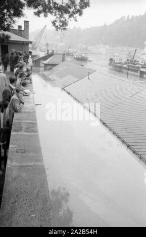 The flood in Passau and other parts of Lower Bavaria (July, 1954) were also referred to as the flood of the century. The Danube, Inn and Ilz had overflowed their banks, and flooded towns and villages. Photo of a flooded district of Passau. Stock Photo