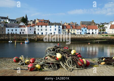 Buoys and ropes stored on quay at St Monans harbour Fife Stock Photo