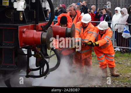 Volunteers turning Tornado steam engine on turntable at Ferryhill Railway Heritage Trust Aberdeen Stock Photo