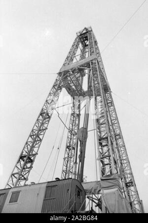 At the exploratory oil well 'Miesbach 1' at Miesbach is drilled for natural gas at a depth of 6,000 meters. Well recognizable: the oil-well derrick. Stock Photo