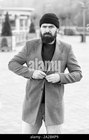 Hipster outfit and hat accessory. Casual outfit spring season. Menswear and  male fashion concept. Man bearded hipster stylish fashionable coat and hat.  Comfortable outfit. Comfortable with his style Stock Photo - Alamy