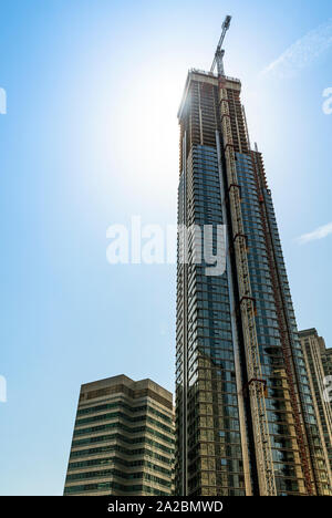 New modern office skyscraper being built in a city Stock Photo