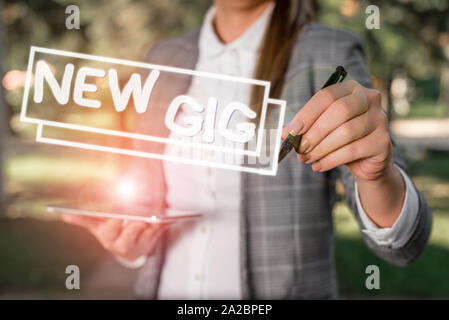 Text sign showing New Gig. Business photo showcasing getting job Attending live Concert Gigabyte Freelancer offer Outdoor background with business wom Stock Photo