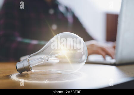 Creativity and innovative are keys to success.Concept of new idea and innovation with Brain and light bulbs. Stock Photo