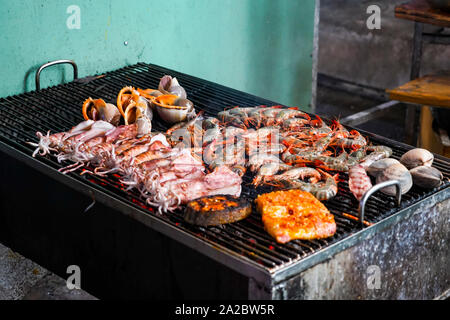 Street food in Phu Quoc island in Vietnam. Delicious seafood for tourist at market at night. Stock Photo