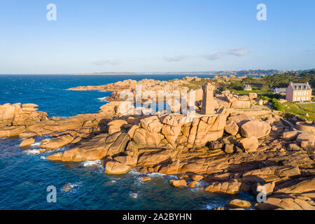 France, Cotes d'Armor, Cote de granit rose (Pink Granite Coast), Perros Guirec, Ploumanac'h, Pointe de Squeouel, Ploumanac'h or Mean Ruz lighthouse (a Stock Photo