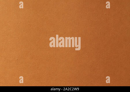 Clean orange paper texture. High resolution photo. Color paper, yellow paper. Empty orange paper backgrounds. Stock Photo