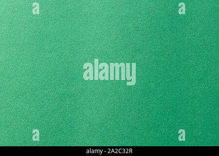 Clean green paper texture with simple surface. High resolution photo. Color paper, light green paper. Empty green paper backgrounds. Stock Photo