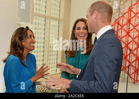The Duke and Duchess of Cambridge talk with Shazia Murza as they attend a special event hosted by the Aga Khan ahead of their official visit to Pakistan, at the Aga Khan Centre in King's Cross, London. Stock Photo