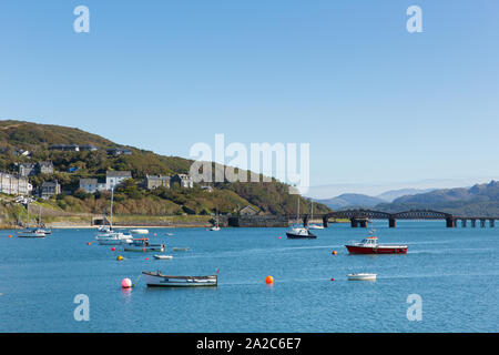 Boats in the bay and bridge Barmouth Gwynedd north west Wales a beautiful seaside town on the edge of the Snowdonia National Park, and south of the Ll Stock Photo