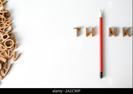 One  Pencil with word think leadership and uniqueness concept. Stand out from the crowd. Think outside the box. Dare to be different