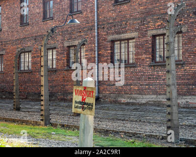 Electrified Fence at Auschwitz-Birkenau Concentration Camp, Poland Stock Photo