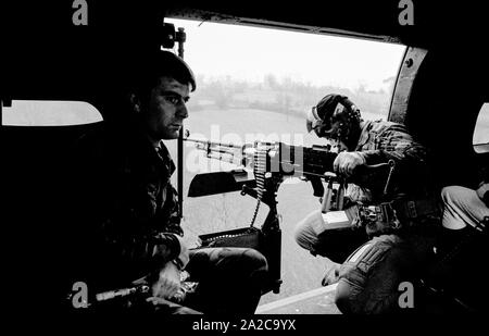 Soldiers from the Royal Scots (the Royal Regiment) army regiment, on patrol in Forkhill, South Armagh, Northern Ireland, in December 1992. Stock Photo