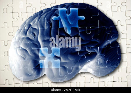 human brain and jigsaw puzzle with missing pieces - Alzheimer Stock ...