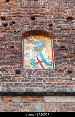 Milan, Italy - January 19, 2018: Sforza Castle wall with Coat of arms of the Visconti family on it Stock Photo