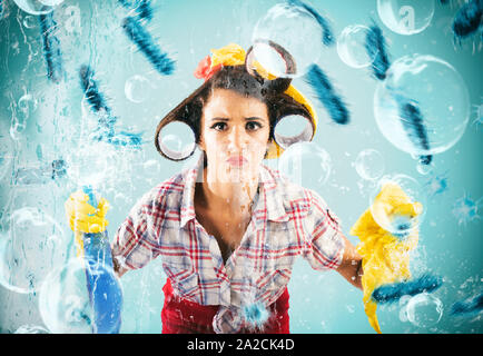 Funny housewife cleans and disinfects to keep germs away Stock Photo