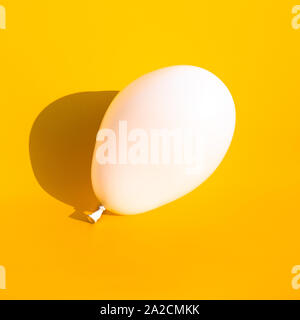 Colorful balloon with shadow on blue color background.party and celebration concepts ideas Stock Photo
