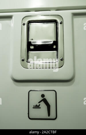 Symbols in a modern toilet of the stadler electric train, close-up Stock Photo
