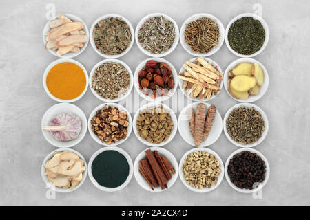 Asthma and respiratory relieving herbs, spice and supplement powders used in natural and chinese herbal medicine in porcelain bowls. Flat lay. Stock Photo