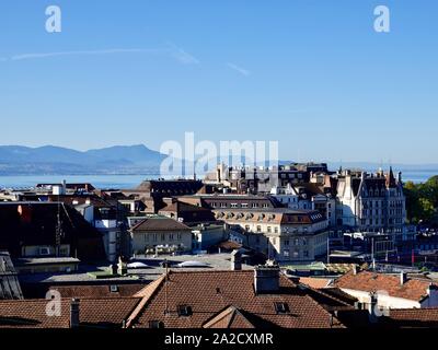 Looking over the rooftops of Lausanne, Switzerland towards Lake Geneva and the mountains. Stock Photo