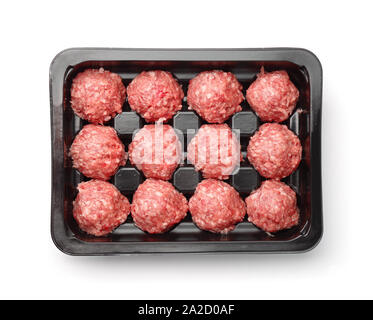 Top view of raw beef meatballs in plastic tray isolated on white Stock Photo