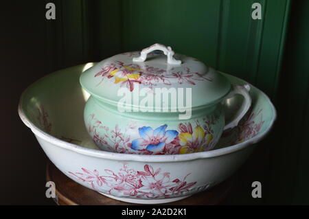Colourful teapot in a bowl Stock Photo